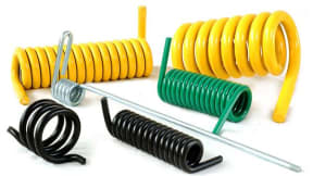 Torsion springs with parallel, transversal and shaped shanks