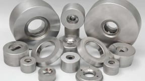 Tungsten carbide drawing dies for wire, bar, and tube drawing