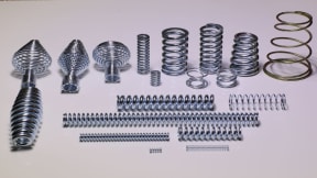 Helical compression springs