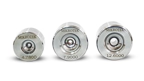 Tungsten carbide extrusion dies and tapered inserts