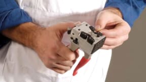 Hand-held cold pressure welder for fine non-ferrous wire