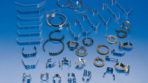 Componenti metallici per illuminotecnica e maniglieria