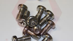 Captive screws in multiple materials