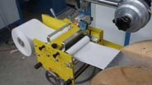 Inseritori automatici di carta per filo e cavo