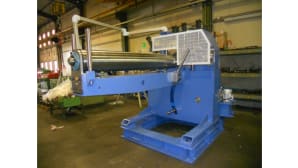 In-line unwinding machines upstream of cold headers