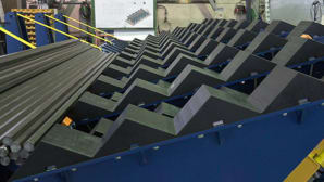 Separator system for tubes, pipes, profiles, and wire