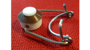 Electronic bending and assembly machine for swing top bottle caps