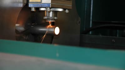 Metal tube laser cutting