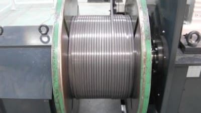 Two-sided spool fixation