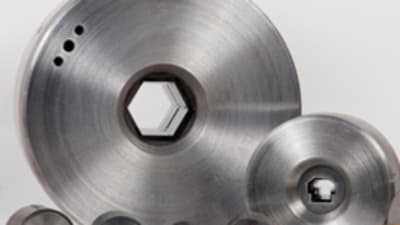 Tungsten carbide shaped dies for wire drawing