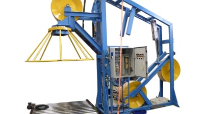 Vertical flyer wire pay-off with roller conveyor