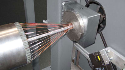 Screening and jacketing line for energy cables