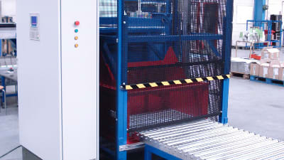 Lift and tip unit to bring bulk containers to higher level