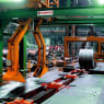 Circumferential and radial coil strapping machines