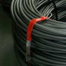Anti-abrasion protecting covering for wire rolls