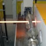 Induction heating systems for heat treatment of wire and profiles