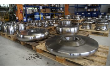 Steel and tungsten carbide rolls for tube forming and straightening