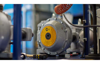 Pneumatic caliper brakes for drawing, stranding, and rolling machines