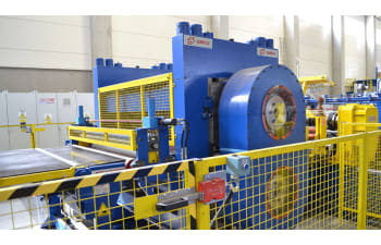 Strip joiners, embossers, and scrap shears for strip processing lines