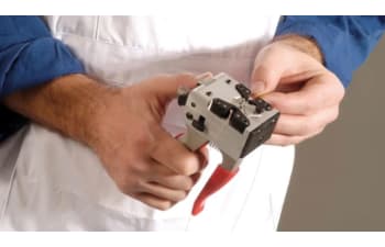 Hand-held cold pressure welder for fine non-ferrous wire