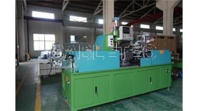 Wire coiling and packing machines