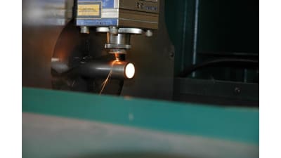 Metal tube laser cutting