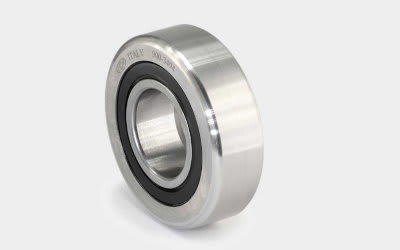 Silver metal bearing with a visible black seal, engraved with 'CGF', 'ITALY', and '900-3014'.