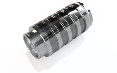 Metallic core drill bit with a banded, polished cylindrical body and a cutting end.