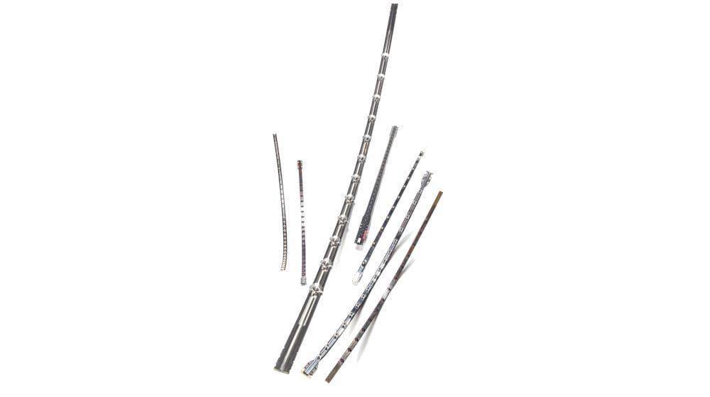 Various metallic industrial rods and probes with segmented designs, arranged diagonally on a white background.