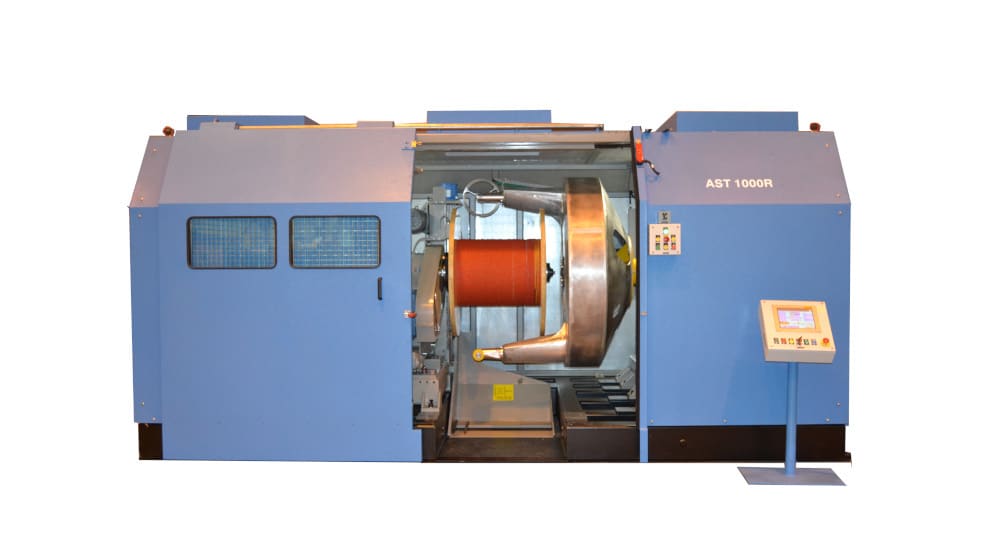 Blue AST 1000R industrial wire and cable winding machine with a large orange spool loaded inside