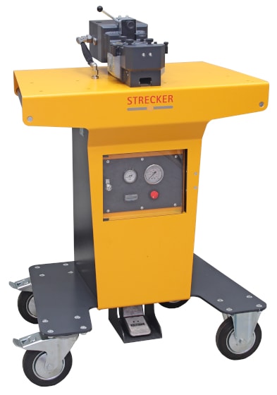 STRECKER hydraulic swaging machine, yellow and grey, with a top operating unit, front control panel, foot pedal, and mobile base on caster wheels.