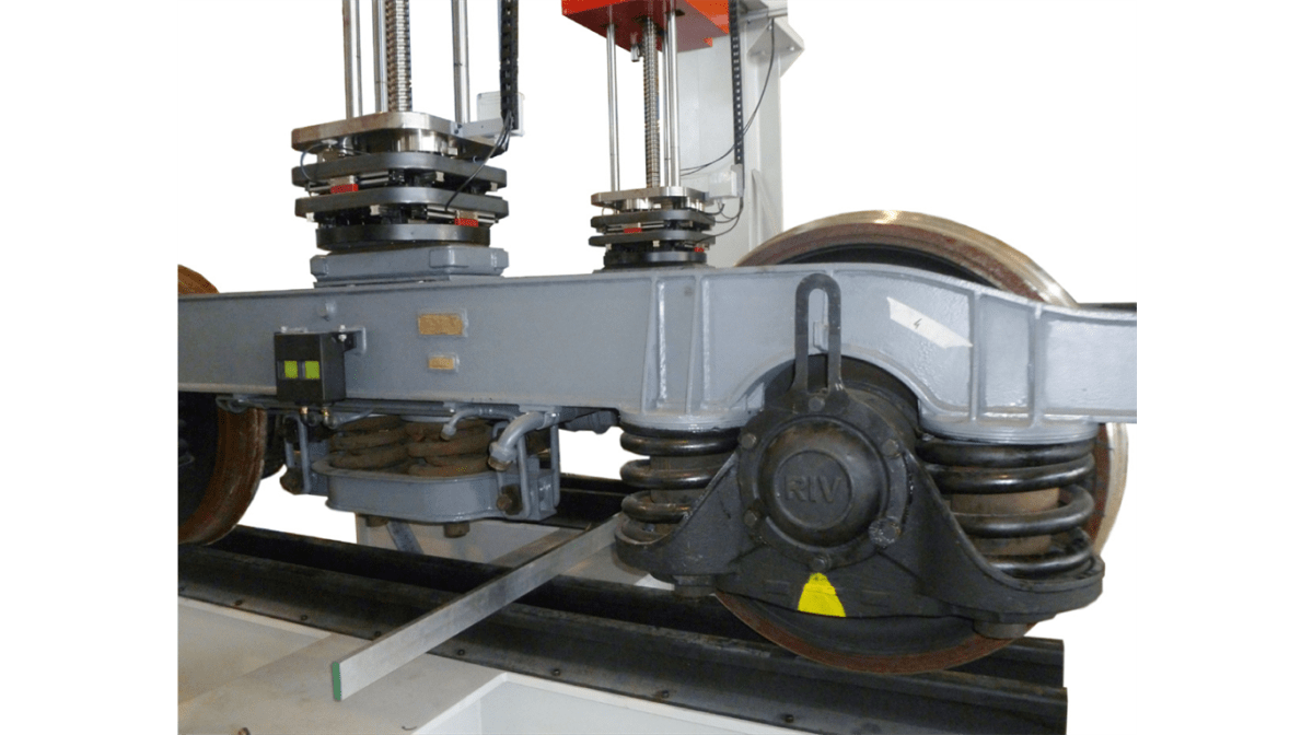 EASYDUR: PORTIQUE BOGIE, essais de compression sur chariots ferroviaires