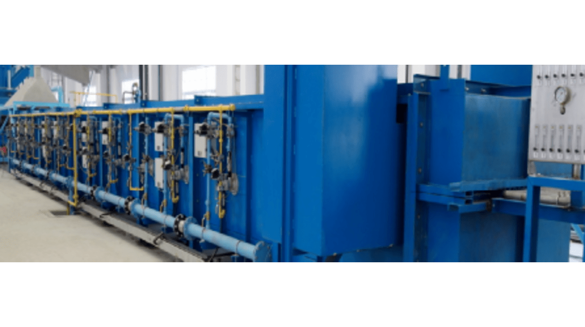 QED presenting pulse-firing muffle tube furnaces at Interwire