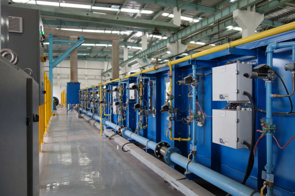 Overview of QED muffle tube furnace for wire austenitizing and annealing