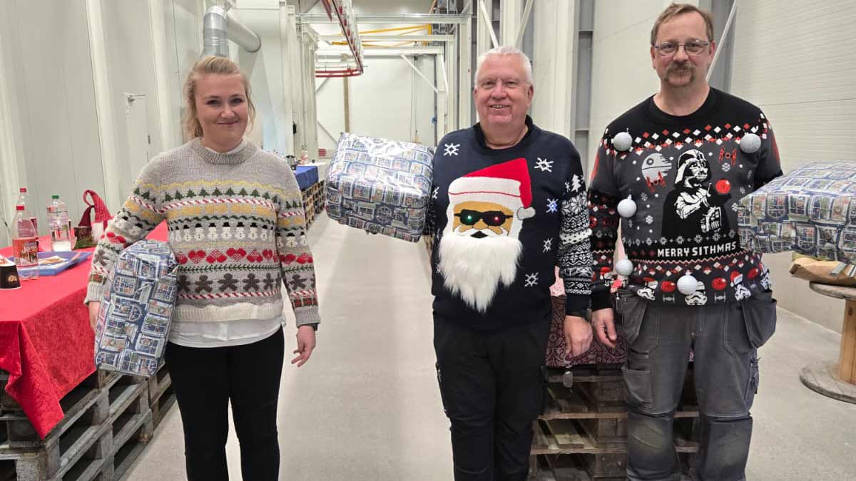 Lämneå Bruk team gathered in the workshop for a Christmas celebration