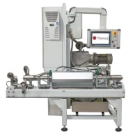 Automated industrial processing machine with touchscreen control panel and rollers for product handling.