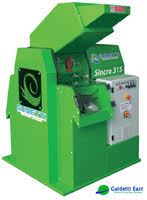 Bright green industrial granulator machine, Sincre 315 model, by Guidetti
