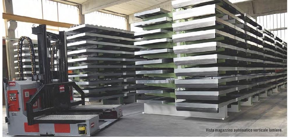 Automated vertical warehouse system for sheet metal storage, showing a robotic retrieval machine next to tall, multi-level racks filled with stacks of metal sheets.