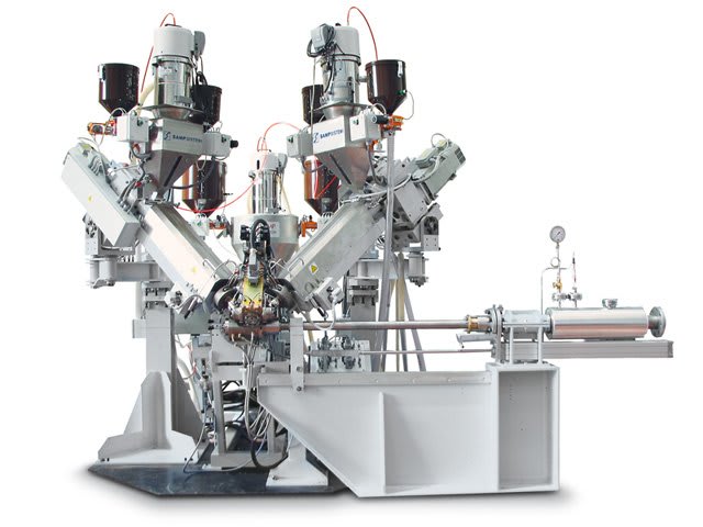 SAMP SYSTEM industrial extrusion machine with multiple material hoppers and converging processing units on a white background.