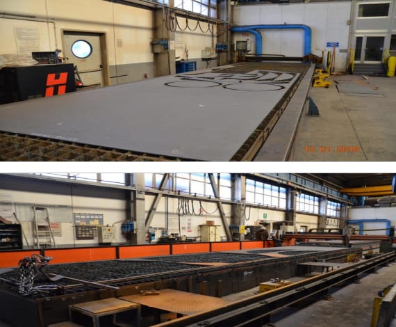 Large industrial CNC plasma cutting machine processing sheet metal with intricate part outlines on its bed, situated within a manufacturing workshop.
