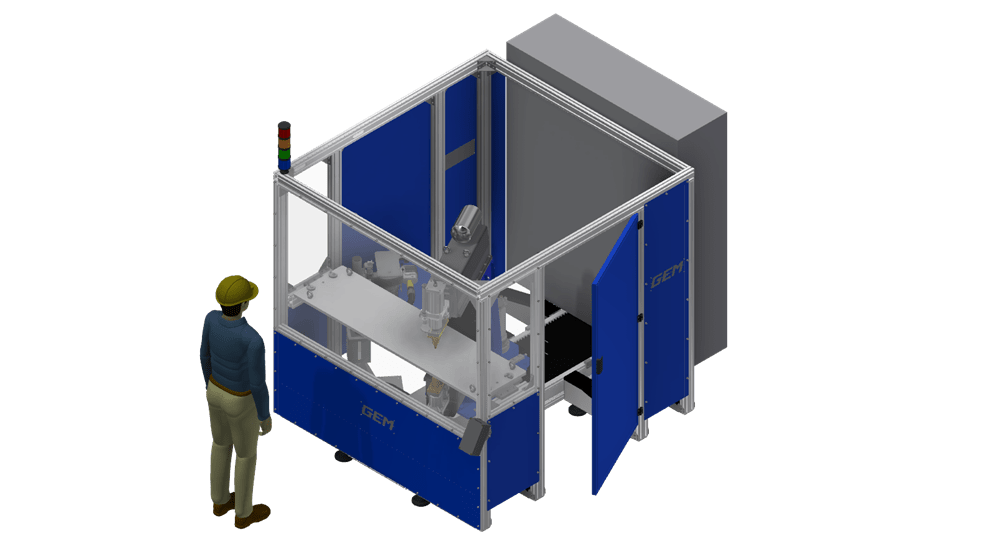 GEM industrial automation machine, a robotic workcell with blue panels and a multi-colored stack light, observed by an operator in a hard hat.