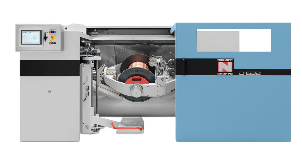 Niehoff Gruppe D 632 industrial wire drawing machine with a large copper coil inside and a digital control panel on the left.