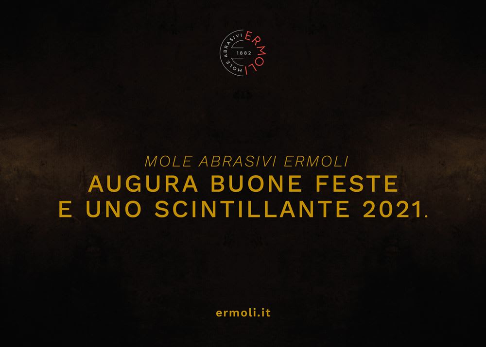 Biglietto di auguri di Mole Abrasivi Ermoli per buone feste e un scintillante 2021, con il logo aziendale circolare contenente la scritta "Mole Abrasivi Ermoli" e l'anno 1882, e l'indirizzo del sito web ermoli.it.