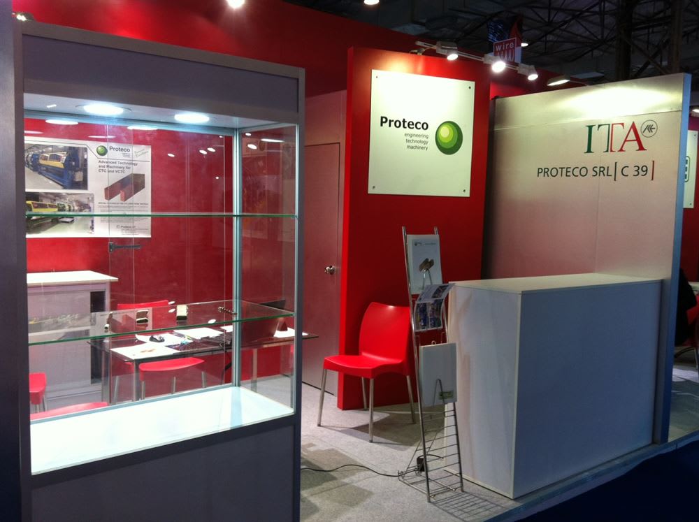 Exhibition map highlighting booth G22 in Hall 11, next to a banner for the Wire Düsseldorf 2022 trade fair. The banner details the event dates (June 20-24, 2022), location (Düsseldorf, Germany), and features the Wire Düsseldorf logo over a woven wire texture.