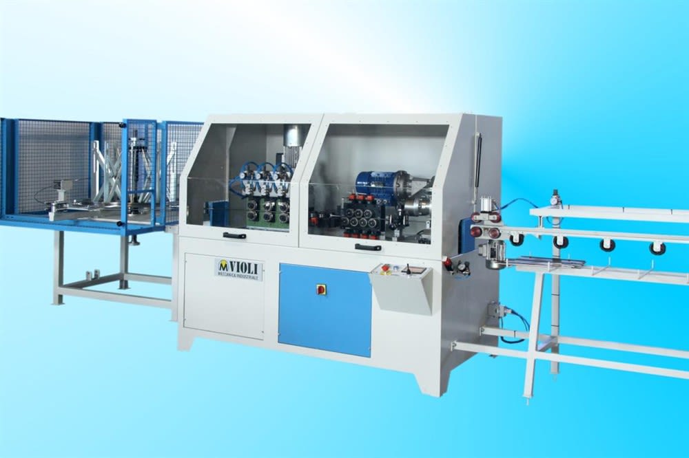 Macchina automatica Violi Meccanica Industriale per la lavorazione di profili o fili, dotata di modulo di alimentazione e guida prodotto.