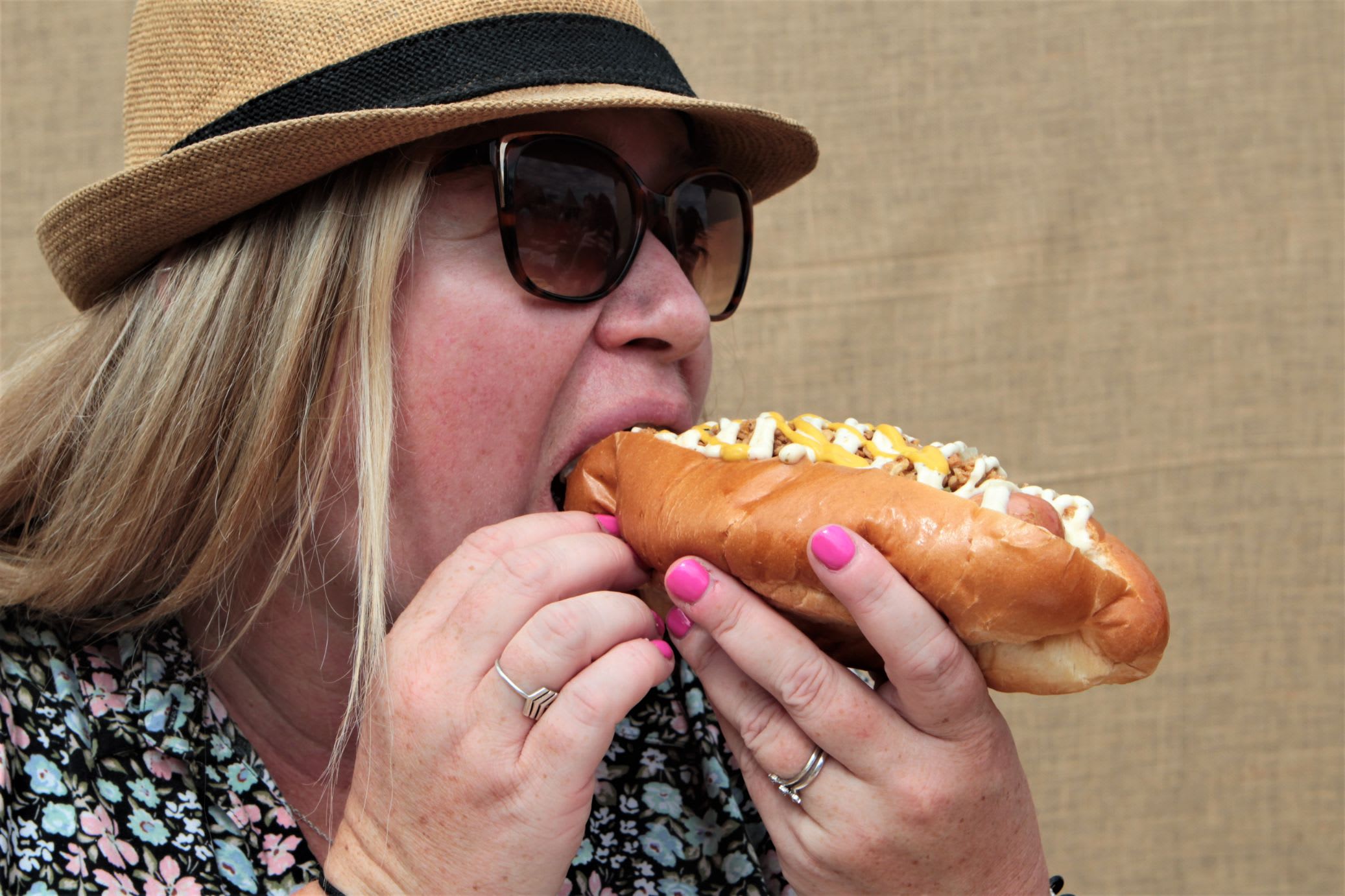 Eating a vegan hotdog