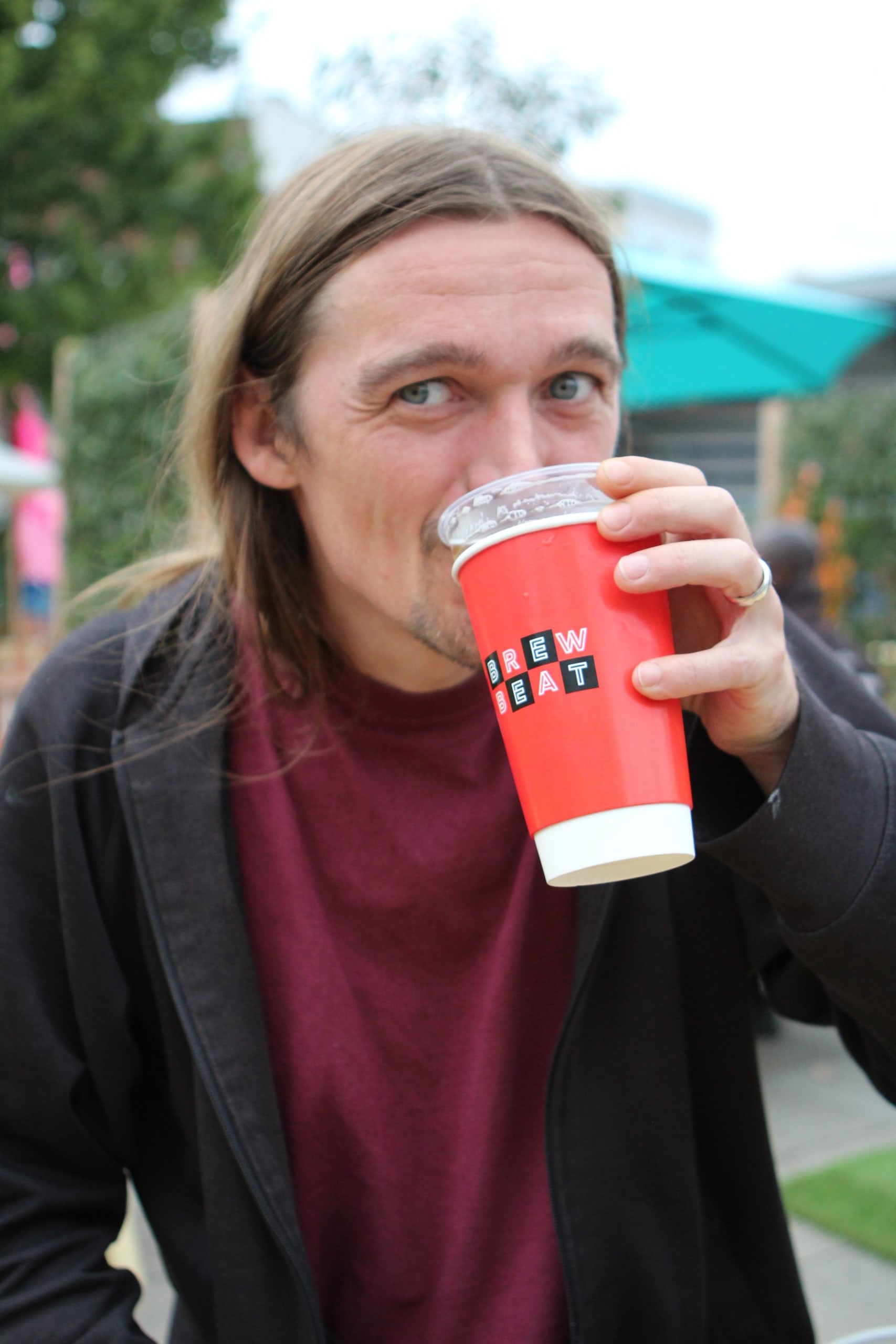 enjoying a pint of craft beer