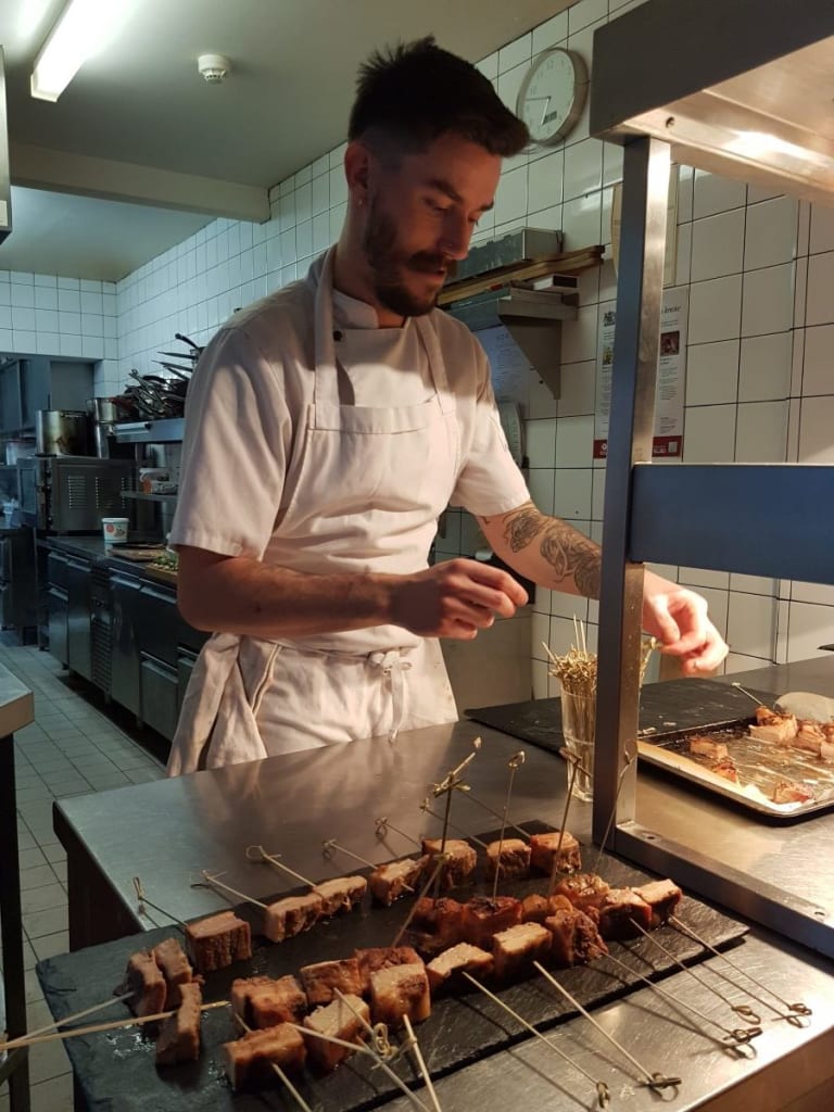 Chef Joe plates up the canapes at North Bar & Kitchen
