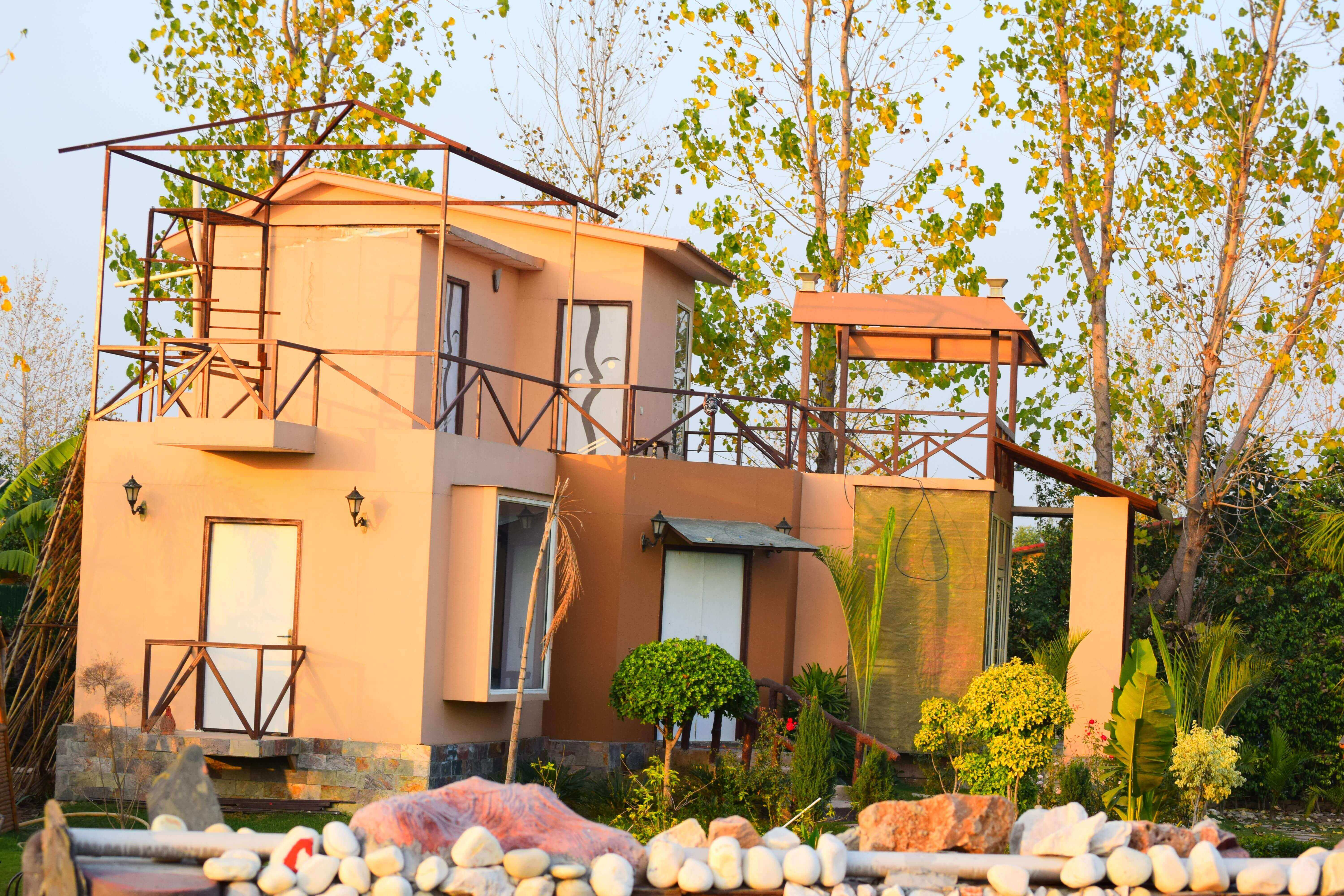 Green Beauty Farms Noida — farmhouse community view