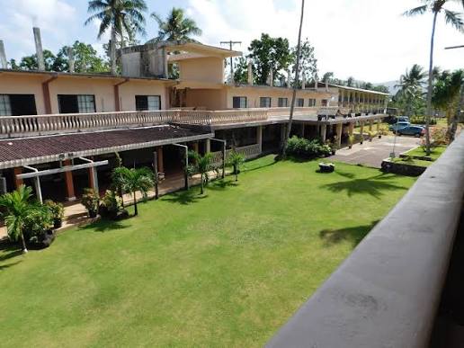 Hillside terraces of the Cliff Rainbow Hotel overlooking Kolonia harbour, Pohnpei